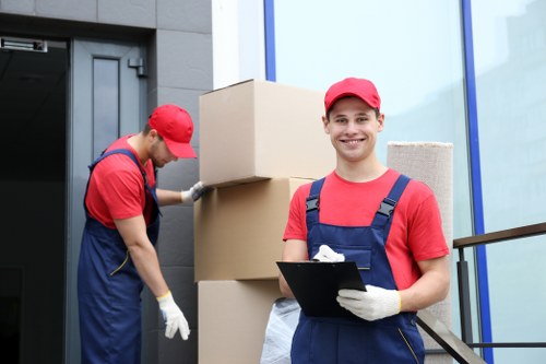 Employees following safe storage procedures at Fortisgreen Storage